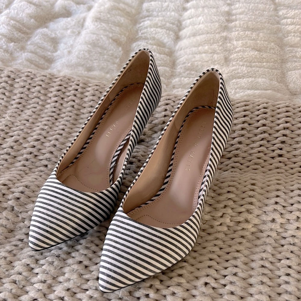 Never worn Kelly and Katie white and black striped heel size 8